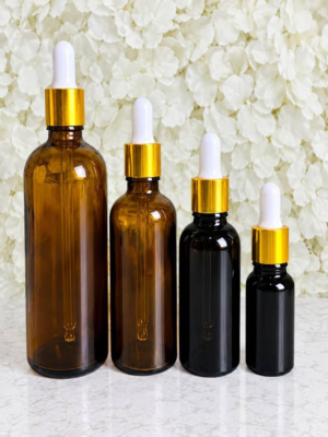 amber bottles with golden dropper